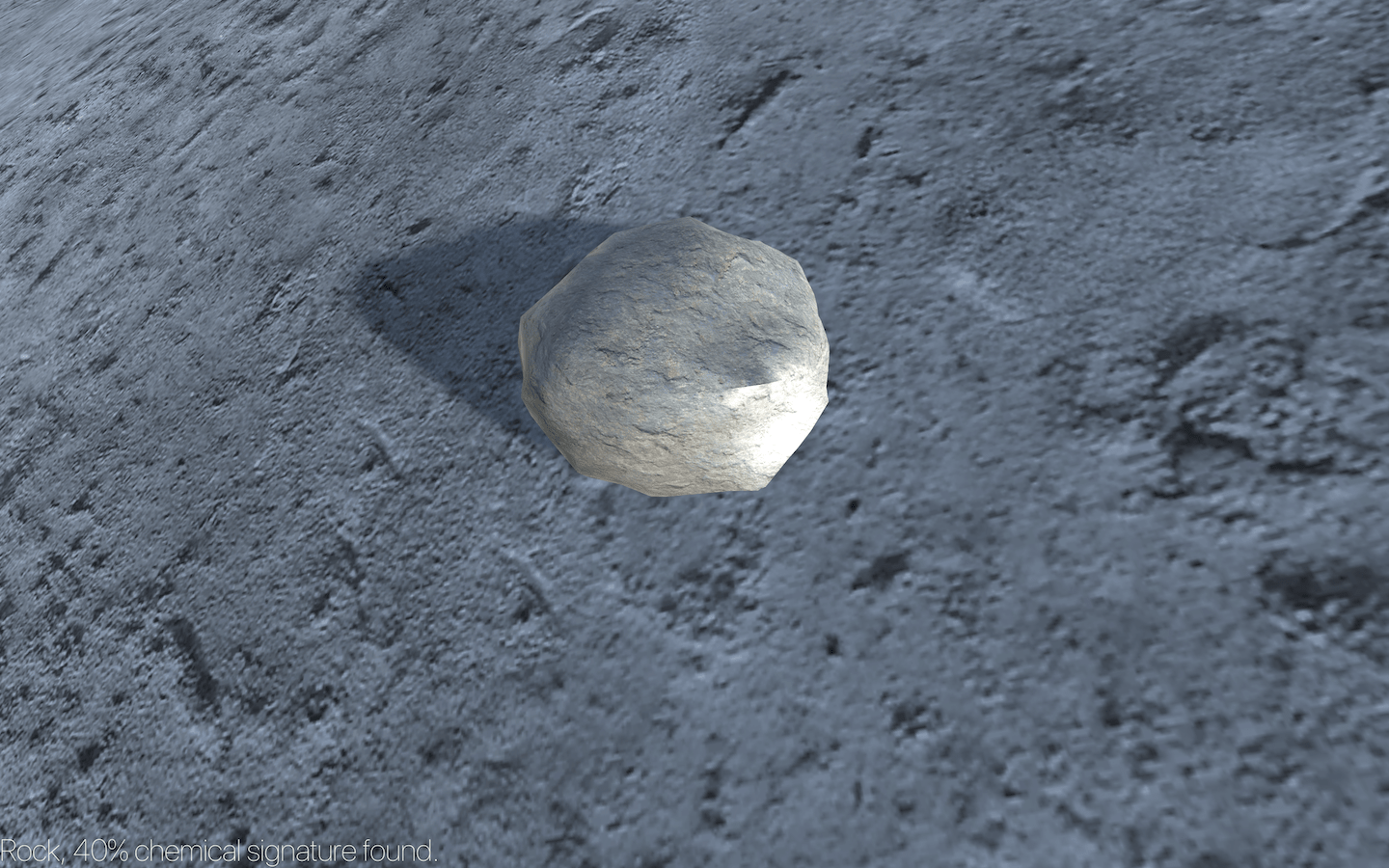 Close up picture of a large rock on gray ground