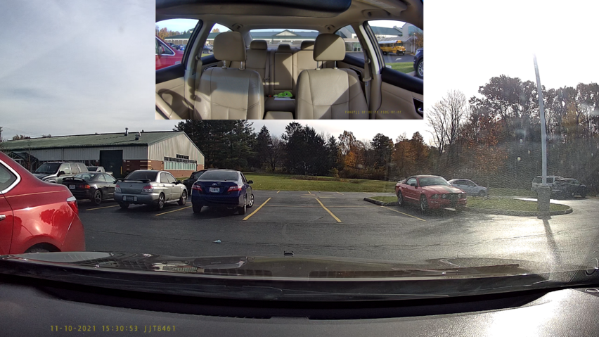 A screenshot of forward-facing dashcam video, with a smaller screenshot from interior facing dashcam video above